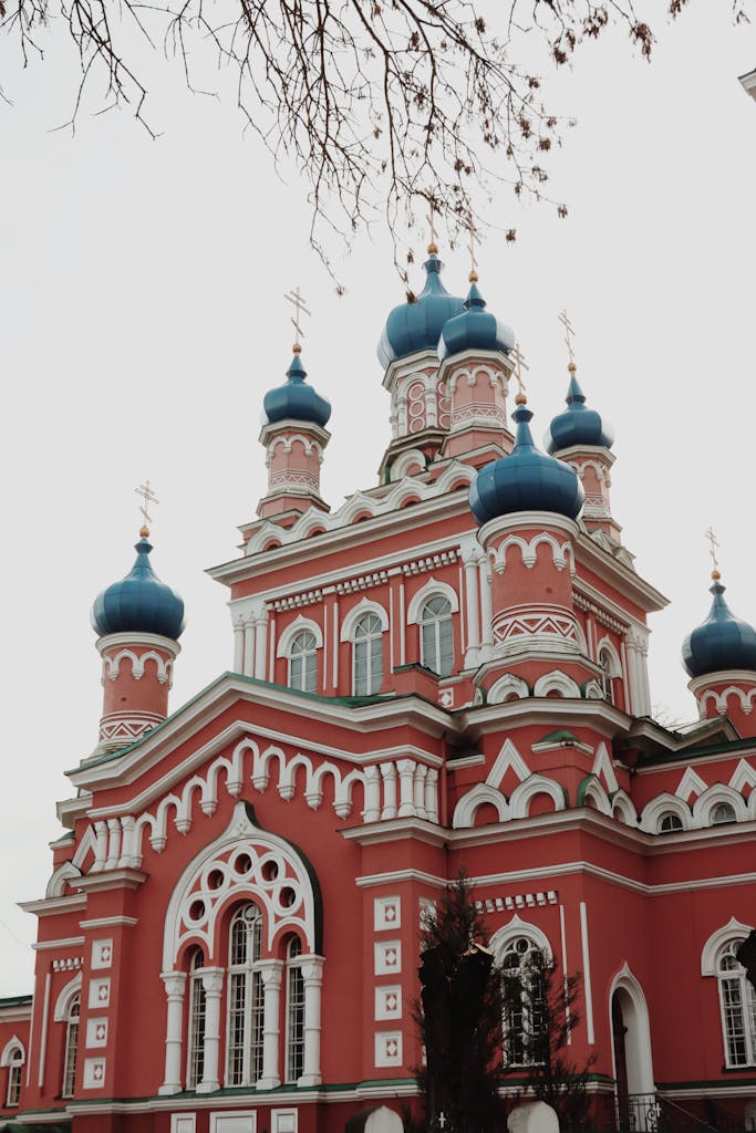 Capture of the vibrant red and blue domes of an Orthodox church in Riga, Latvia.